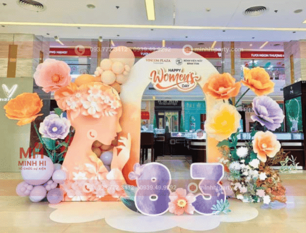 Trang trí backdrop 20/10 với hoa tươi và hoa giấy dạng photobooth cho trung tâm thương mại hay siêu thị