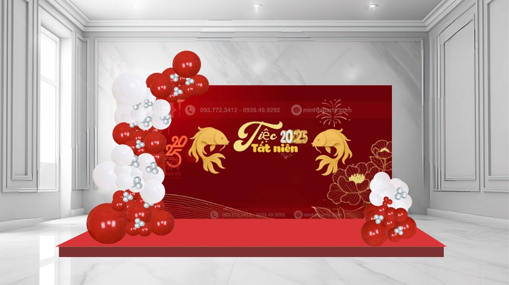 Trang trí backdrop tiệc tất niên với chủ đề tết và tông màu đỏ chủ đạo