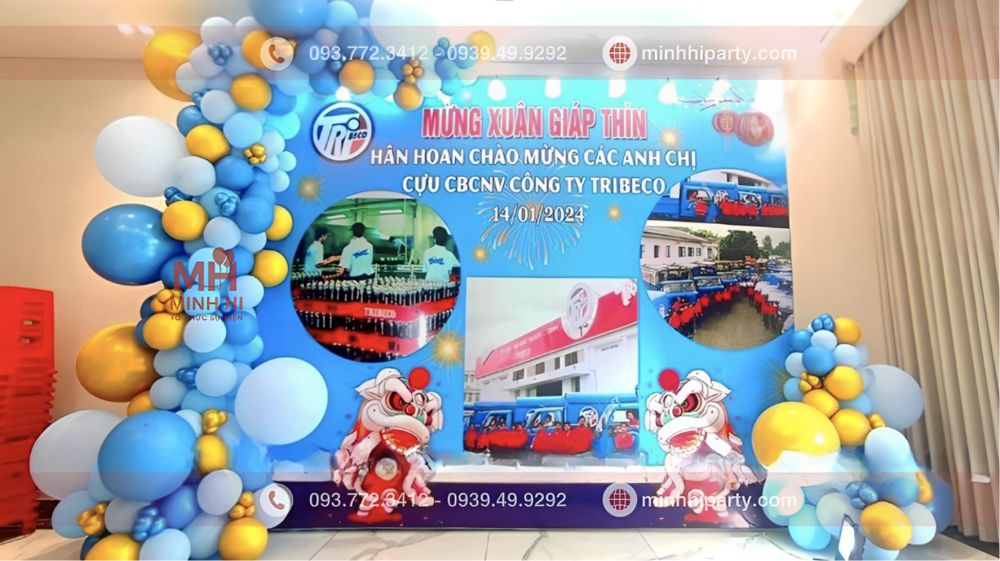 Trang trí phông nền tiệc tất niên chủ đề doanh nghiệp tribeco