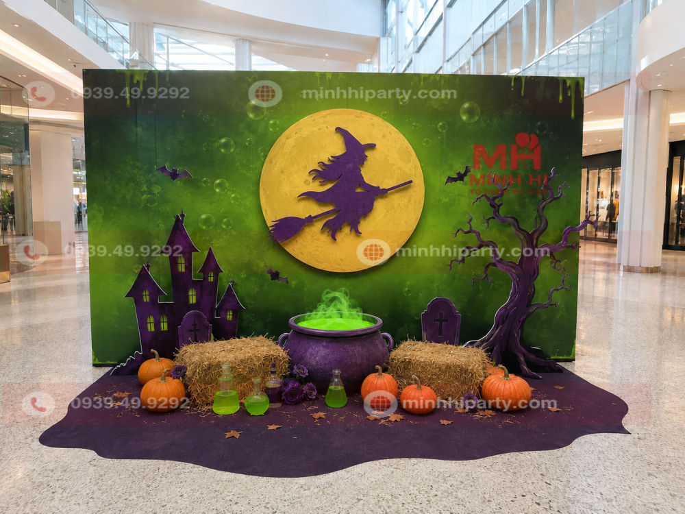 Trang trí backdrop Halloween xanh lá với mặt trăng vàng, phù thủy tím và nồi độc dược